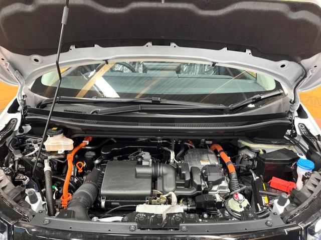 フリード e:HEVエアー EX 登録済未使用車 11型ナビ 両側電動ドア 後席ウォークスルー ブラインドスポットモニター シートヒーター レーダークルーズ バックカメラ 純正15インチアルミ LEDヘッド クリアランスソナー(19枚目)