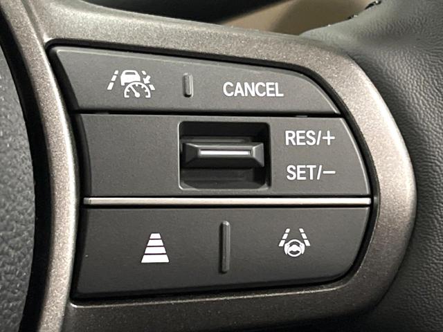 フリード e:HEVエアー EX 登録済未使用車 11型ナビ 両側電動ドア 後席ウォークスルー ブラインドスポットモニター シートヒーター レーダークルーズ バックカメラ 純正15インチアルミ LEDヘッド クリアランスソナー(33枚目)