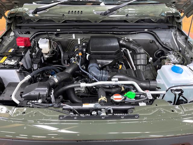 ジムニー ＸＧ　届出済未使用車　４ＷＤ　５ＭＴ　スズキセーフティサポート　車線逸脱警報　コーナーセンサー　オートライト　ダウンヒルアシスト　横滑り防止装置　キーレスキー　盗難防止装置　アイドリングストップ（18枚目）