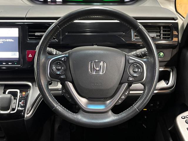 ステップワゴンスパーダ スパーダハイブリッド　Ｇ・ＥＸ　ホンダセンシング　禁煙車　後席モニター　９型ナビ　全周囲カメラ　両側電動ドア　ホンダセンシング　シートヒーター　ＡＣ１００Ｖ電源　わくわくゲート　レーダークルーズ　純正１６インチアルミ　ＬＥＤヘッド　フルセグ　ＥＴＣ（12枚目）