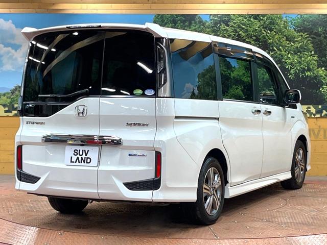 ステップワゴンスパーダ スパーダハイブリッド　Ｇ・ＥＸ　ホンダセンシング　禁煙車　後席モニター　９型ナビ　全周囲カメラ　両側電動ドア　ホンダセンシング　シートヒーター　ＡＣ１００Ｖ電源　わくわくゲート　レーダークルーズ　純正１６インチアルミ　ＬＥＤヘッド　フルセグ　ＥＴＣ（18枚目）