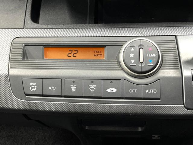 フリード Ｇ　ジャストセレクション　禁煙車　電動スライドドア　ウォークスルー　ＨＩＤヘッド　オートエアコン　ＣＤ　衝突安全ボディ　オートライト　電動格納ミラー（4枚目）