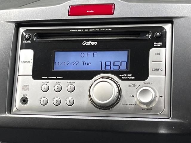 フリード Ｇ　ジャストセレクション　禁煙車　電動スライドドア　ウォークスルー　ＨＩＤヘッド　オートエアコン　ＣＤ　衝突安全ボディ　オートライト　電動格納ミラー（5枚目）