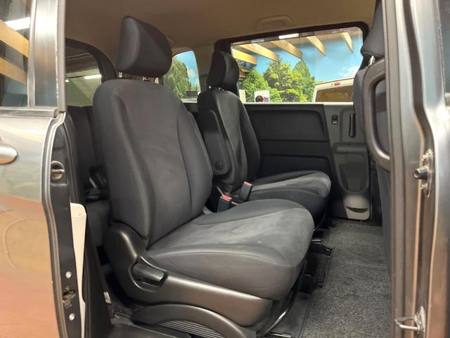 フリード Ｇ　ジャストセレクション　禁煙車　電動スライドドア　ウォークスルー　ＨＩＤヘッド　オートエアコン　ＣＤ　衝突安全ボディ　オートライト　電動格納ミラー（7枚目）