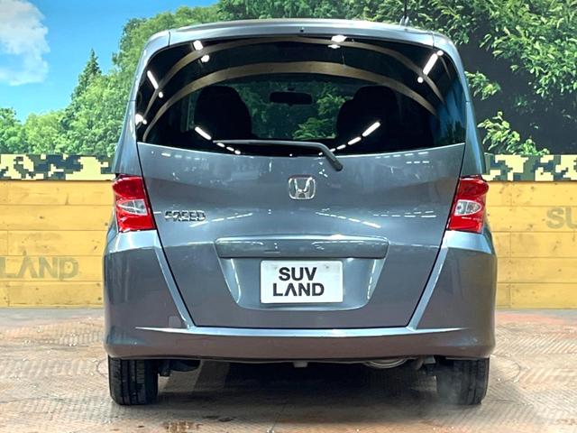 フリード Ｇ　ジャストセレクション　禁煙車　電動スライドドア　ウォークスルー　ＨＩＤヘッド　オートエアコン　ＣＤ　衝突安全ボディ　オートライト　電動格納ミラー（14枚目）