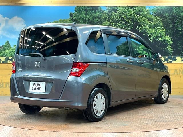 フリード Ｇ　ジャストセレクション　禁煙車　電動スライドドア　ウォークスルー　ＨＩＤヘッド　オートエアコン　ＣＤ　衝突安全ボディ　オートライト　電動格納ミラー（16枚目）