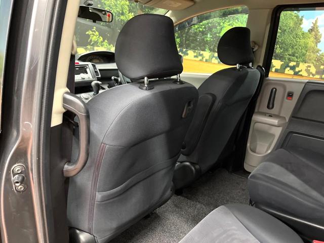 フリード Ｇ　ジャストセレクション　禁煙車　電動スライドドア　ウォークスルー　ＨＩＤヘッド　オートエアコン　ＣＤ　衝突安全ボディ　オートライト　電動格納ミラー（34枚目）