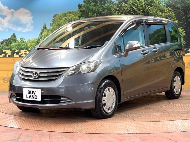 フリード Ｇ　ジャストセレクション　禁煙車　電動スライドドア　ウォークスルー　ＨＩＤヘッド　オートエアコン　ＣＤ　衝突安全ボディ　オートライト　電動格納ミラー（37枚目）