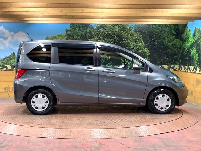 フリード Ｇ　ジャストセレクション　禁煙車　電動スライドドア　ウォークスルー　ＨＩＤヘッド　オートエアコン　ＣＤ　衝突安全ボディ　オートライト　電動格納ミラー（42枚目）