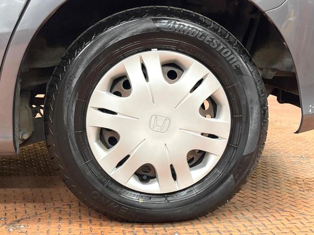 フリード Ｇ　ジャストセレクション　禁煙車　電動スライドドア　ウォークスルー　ＨＩＤヘッド　オートエアコン　ＣＤ　衝突安全ボディ　オートライト　電動格納ミラー（43枚目）