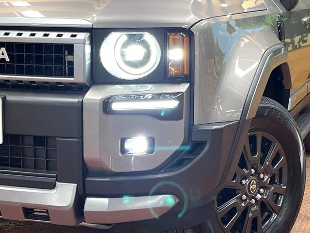 ランドクルーザー250 VX モデリスタバンパーガード 丸目LEDヘッド シグネチャーイルミブレード サンルーフ 12型ディスプレイ 全周囲カメラ 7人乗り 禁煙 ルーフレール シートエアコン 電動リアドア デジタルミラー ETC(12枚目)