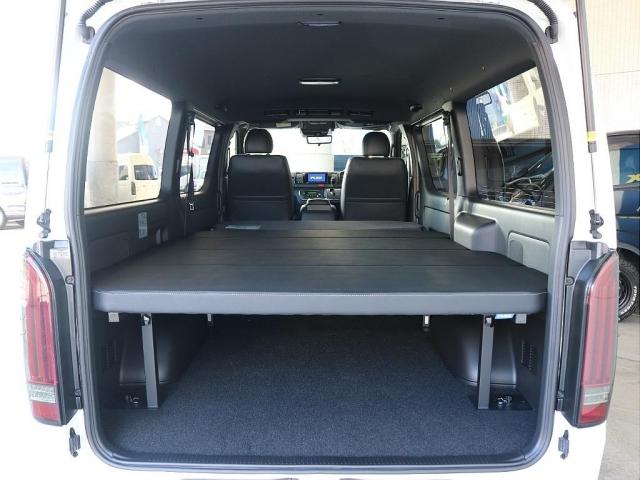 ハイエースバン ロングスーパーＧＬ　ダークプライムＳ　カロッツェリア７インチナビ　ＥＴＣ２．０　Ｔフォースフロントスポイラー　オープンカントリー　ＮＣ１・１６インチ　アルティメットテール　ベッドキット　デジタルインナーミラー　パノラミックビューモニター（10枚目）