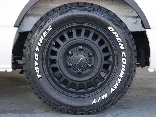 ハイエースバン ロングスーパーＧＬ　ダークプライムＳ　カロッツェリア７インチナビ　ＥＴＣ２．０　Ｔフォースフロントスポイラー　オープンカントリー　ＮＣ１・１６インチ　アルティメットテール　ベッドキット　デジタルインナーミラー　パノラミックビューモニター（14枚目）