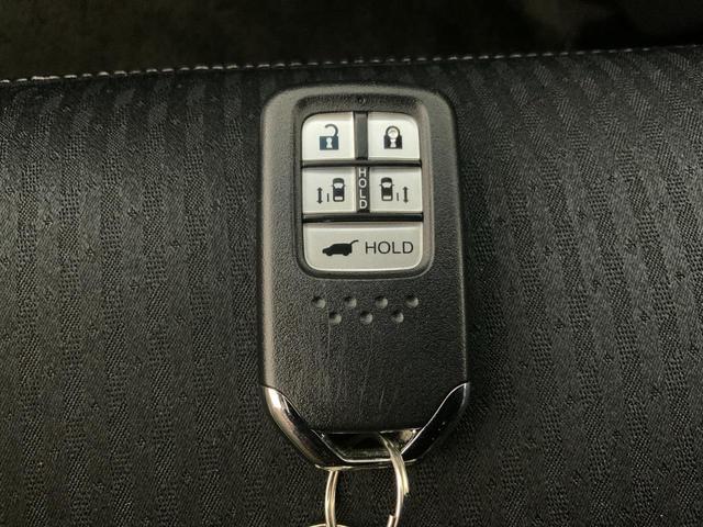 オデッセイハイブリッド e:HEVアブソルート・EX 10型インターナビ/フリップダウン/ETC2.0/前後ドラレコ/マルチビュー/衝突軽減/追従クルコン/誤発進抑制/LKAS/後側方警戒/電動Bドア/両パワスラ/リアAAC/前席Pシート・シートヒーター(63枚目)