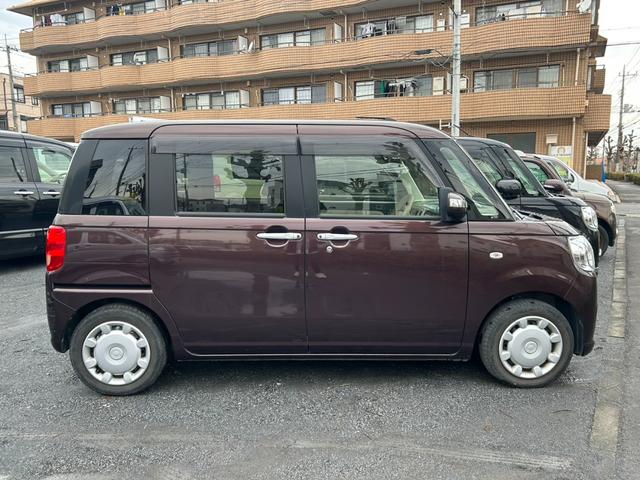 ムーヴキャンバス Ｘリミテッド　ＳＡＩＩ　プッシュスタート　両側電動スライドドア　エアコン　ＴＶナビ　全方位モニター　トラクションコントロール　アイドリングストップ　パワステ　パワーウインドウ　Ｗエアバッグ（4枚目）