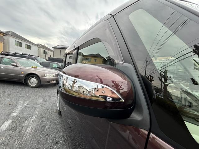 ムーヴキャンバス Ｘリミテッド　ＳＡＩＩ　プッシュスタート　両側電動スライドドア　エアコン　ＴＶナビ　全方位モニター　トラクションコントロール　アイドリングストップ　パワステ　パワーウインドウ　Ｗエアバッグ（11枚目）