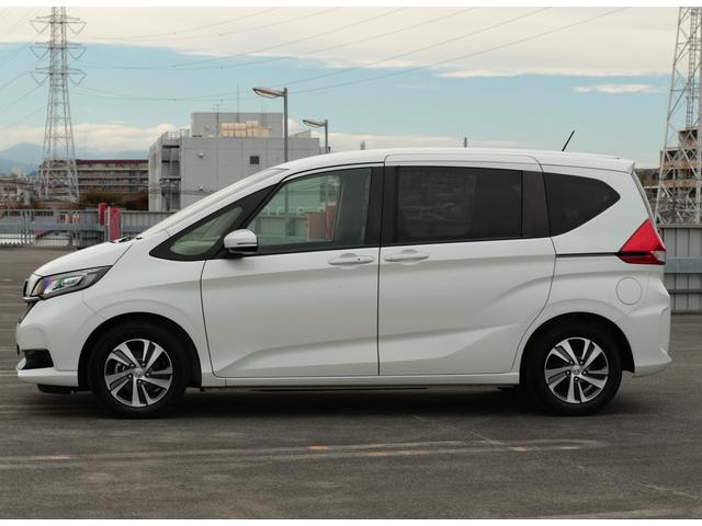 フリード Ｇ・ホンダセンシング　ワンオーナー　禁煙車両　Ｂｌｕｅｔｏｏｔｈフルセグナビ　ＥＴＣ　バックカメラ　前後ドラレコ　スマートキー２個　両側電動スライドドア　ホンダセンシング　６人乗り（3枚目）