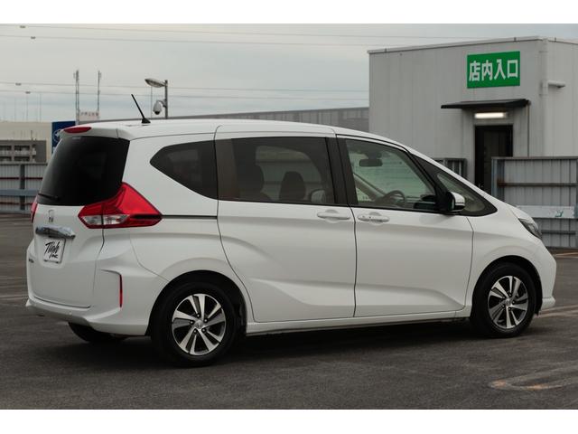 フリード Ｇ・ホンダセンシング　ワンオーナー　禁煙車両　Ｂｌｕｅｔｏｏｔｈフルセグナビ　ＥＴＣ　バックカメラ　前後ドラレコ　スマートキー２個　両側電動スライドドア　ホンダセンシング　６人乗り（6枚目）