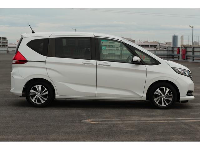 フリード Ｇ・ホンダセンシング　ワンオーナー　禁煙車両　Ｂｌｕｅｔｏｏｔｈフルセグナビ　ＥＴＣ　バックカメラ　前後ドラレコ　スマートキー２個　両側電動スライドドア　ホンダセンシング　６人乗り（7枚目）