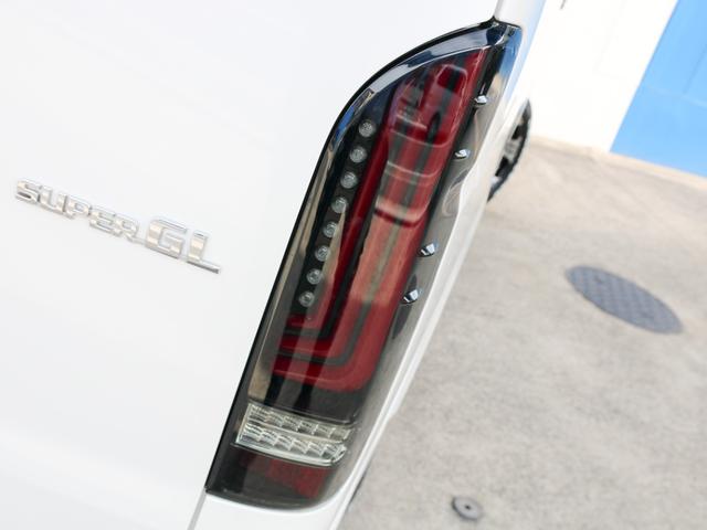 ハイエースバン スーパーＧＬ　ダークプライムＩＩ　バン　スーパーＧＬ　ダークプライムＩＩ　ワイドバン　４ＷＤ　ＵＩビークル強化スタビライザー　ショックアブソーバー　内装架装車ＭＲＴ　アルパインＢＩＧ－Ｘ１１ナビ　ＥＴＣ　間仕切りカーテン　ローダウン車（11枚目）