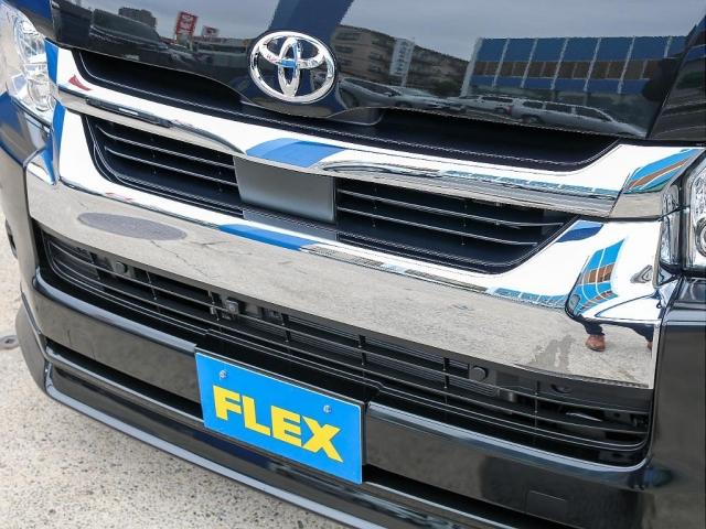 ハイエースワゴン GL ロング ファインテックツアラー オットマン付きキャプテンシート 両側パワースライドドア アルパインBIG-X11ナビ アルパイン12.8型フリップダウンモニター シートカバー キャンピングカー カスタム インテリアパネル ローダウン(4枚目)