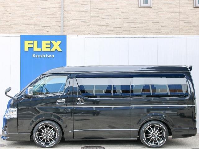 ハイエースワゴン GL ロング ファインテックツアラー オットマン付きキャプテンシート 両側パワースライドドア アルパインBIG-X11ナビ アルパイン12.8型フリップダウンモニター シートカバー キャンピングカー カスタム インテリアパネル ローダウン(7枚目)