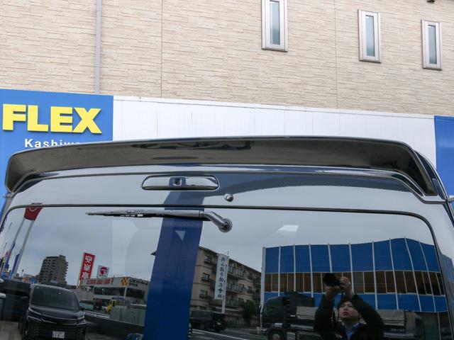 ハイエースワゴン GL ロング ファインテックツアラー オットマン付きキャプテンシート 両側パワースライドドア アルパインBIG-X11ナビ アルパイン12.8型フリップダウンモニター シートカバー キャンピングカー カスタム インテリアパネル ローダウン(10枚目)