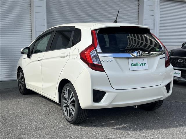 フィットハイブリッド Ｌパッケージ　純正ＨＤＤナビ　ＥＴＣ　ドライブレコーダー　フルセグテレビ　バックカメラ　クルーズコントロール　プッシュスタート　フロアマット　純正１６インチアルミホイール　オートライト　横滑り防止装置（31枚目）