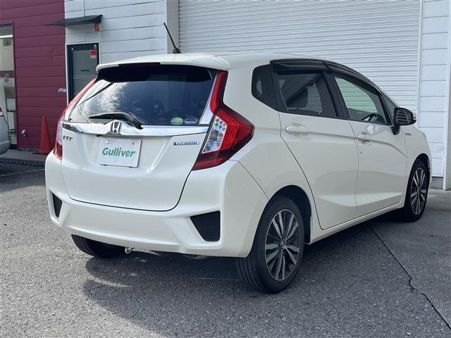 フィットハイブリッド Ｌパッケージ　純正ＨＤＤナビ　ＥＴＣ　ドライブレコーダー　フルセグテレビ　バックカメラ　クルーズコントロール　プッシュスタート　フロアマット　純正１６インチアルミホイール　オートライト　横滑り防止装置（33枚目）