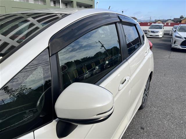 フィットハイブリッド Ｌパッケージ　純正ＨＤＤナビ　ＥＴＣ　ドライブレコーダー　フルセグテレビ　バックカメラ　クルーズコントロール　プッシュスタート　フロアマット　純正１６インチアルミホイール　オートライト　横滑り防止装置（39枚目）