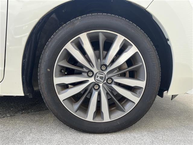 フィットハイブリッド Ｌパッケージ　純正ＨＤＤナビ　ＥＴＣ　ドライブレコーダー　フルセグテレビ　バックカメラ　クルーズコントロール　プッシュスタート　フロアマット　純正１６インチアルミホイール　オートライト　横滑り防止装置（40枚目）