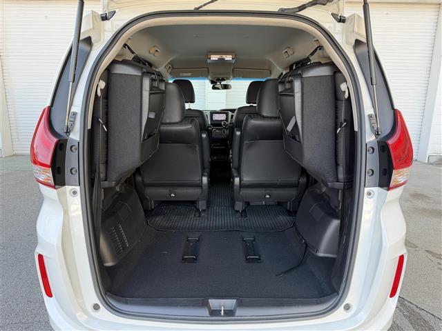 フリード Ｇ・ホンダセンシング　純正ナビ　Ｂｌｕｅｔｏｏｔｈ接続　ＥＴＣ　バックカメラ　後席用モニター　フルセグテレビ　三列シート　純正フロアマット　純正１５インチアルミホイール　両側パワースライドドア　横滑り防止装置（29枚目）