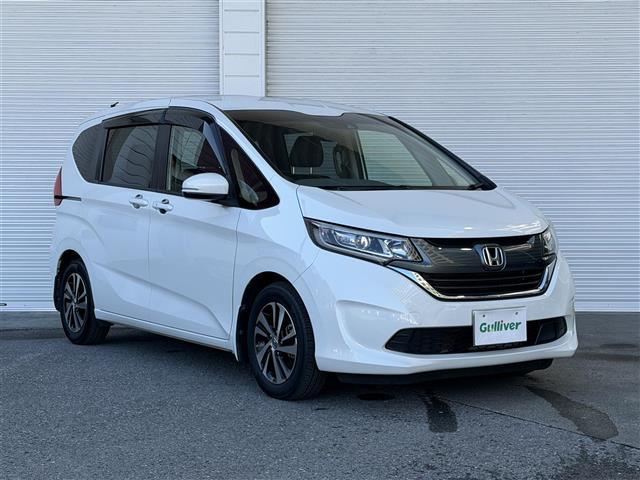 フリード Ｇ・ホンダセンシング　純正ナビ　Ｂｌｕｅｔｏｏｔｈ接続　ＥＴＣ　バックカメラ　後席用モニター　フルセグテレビ　三列シート　純正フロアマット　純正１５インチアルミホイール　両側パワースライドドア　横滑り防止装置（34枚目）