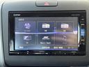 フリード Ｇ・ホンダセンシング　純正ナビ　Ｂｌｕｅｔｏｏｔｈ接続　ＥＴＣ　バックカメラ　後席用モニター　フルセグテレビ　三列シート　純正フロアマット　純正１５インチアルミホイール　両側パワースライドドア　横滑り防止装置（4枚目）