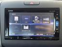 フリード Ｇ・ホンダセンシング　純正ナビ　Ｂｌｕｅｔｏｏｔｈ接続　ＥＴＣ　バックカメラ　後席用モニター　フルセグテレビ　三列シート　純正フロアマット　純正１５インチアルミホイール　両側パワースライドドア　横滑り防止装置（5枚目）
