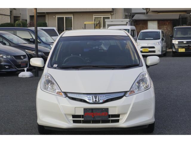 フィットハイブリッド スマートセレクション　１年保証付　純正ＨＤＤナビ　ワンセグＴＶ　バックカメラ　ＣＤ・ＤＶＤ再生　ステアリングスイッチ　ＨＩＤヘッドライト　オートライト　スマートキー　クルーズコントロール　オートエアコン　電動格納ミラー（6枚目）