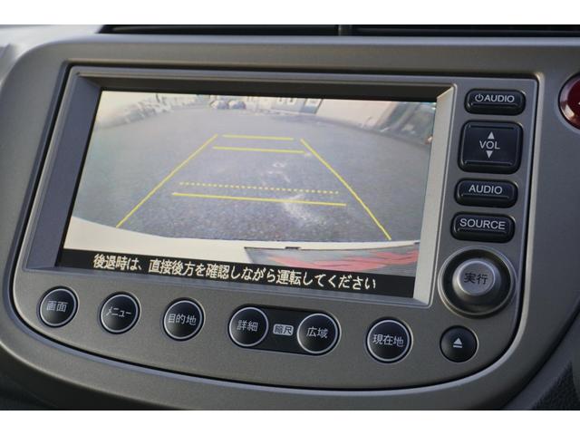 フィットハイブリッド スマートセレクション　１年保証付　純正ＨＤＤナビ　ワンセグＴＶ　バックカメラ　ＣＤ・ＤＶＤ再生　ステアリングスイッチ　ＨＩＤヘッドライト　オートライト　スマートキー　クルーズコントロール　オートエアコン　電動格納ミラー（17枚目）