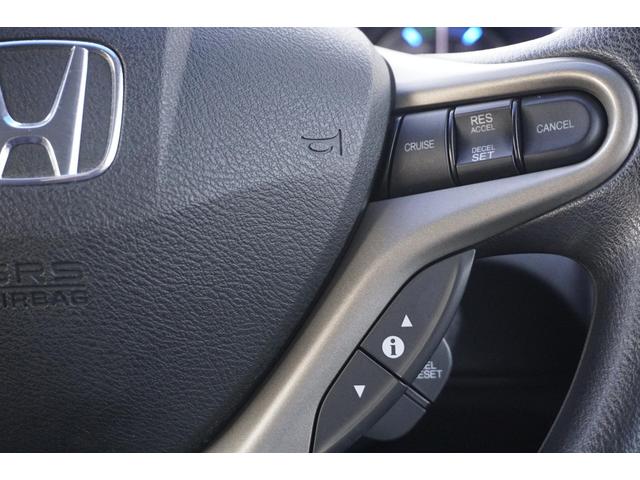 フィットハイブリッド スマートセレクション　１年保証付　純正ＨＤＤナビ　ワンセグＴＶ　バックカメラ　ＣＤ・ＤＶＤ再生　ステアリングスイッチ　ＨＩＤヘッドライト　オートライト　スマートキー　クルーズコントロール　オートエアコン　電動格納ミラー（23枚目）