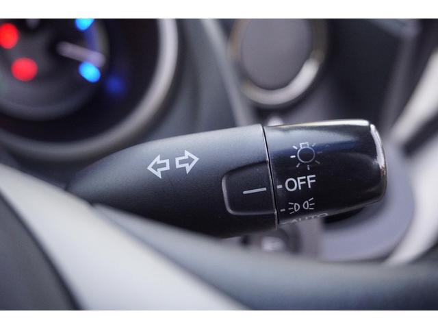 フィットハイブリッド スマートセレクション　１年保証付　純正ＨＤＤナビ　ワンセグＴＶ　バックカメラ　ＣＤ・ＤＶＤ再生　ステアリングスイッチ　ＨＩＤヘッドライト　オートライト　スマートキー　クルーズコントロール　オートエアコン　電動格納ミラー（24枚目）