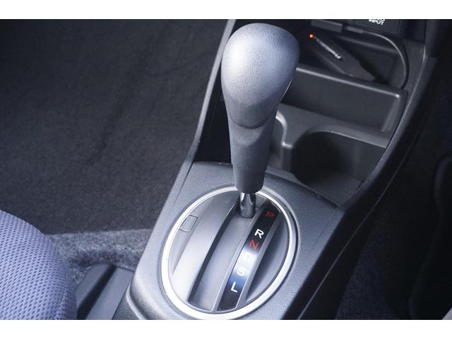 フィットハイブリッド スマートセレクション　１年保証付　純正ＨＤＤナビ　ワンセグＴＶ　バックカメラ　ＣＤ・ＤＶＤ再生　ステアリングスイッチ　ＨＩＤヘッドライト　オートライト　スマートキー　クルーズコントロール　オートエアコン　電動格納ミラー（26枚目）