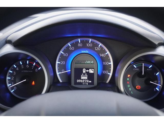 フィットハイブリッド スマートセレクション　１年保証付　純正ＨＤＤナビ　ワンセグＴＶ　バックカメラ　ＣＤ・ＤＶＤ再生　ステアリングスイッチ　ＨＩＤヘッドライト　オートライト　スマートキー　クルーズコントロール　オートエアコン　電動格納ミラー（28枚目）