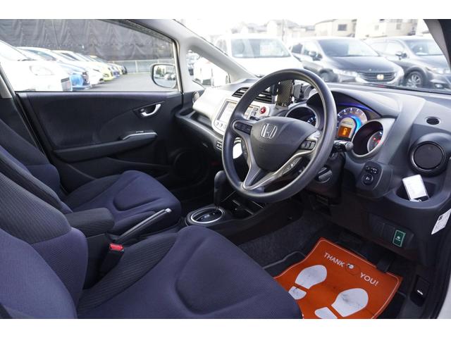 フィットハイブリッド スマートセレクション　１年保証付　純正ＨＤＤナビ　ワンセグＴＶ　バックカメラ　ＣＤ・ＤＶＤ再生　ステアリングスイッチ　ＨＩＤヘッドライト　オートライト　スマートキー　クルーズコントロール　オートエアコン　電動格納ミラー（30枚目）