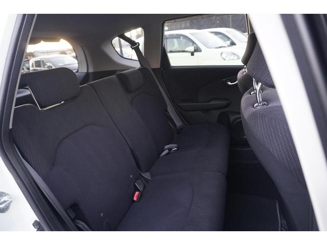 フィットハイブリッド スマートセレクション　１年保証付　純正ＨＤＤナビ　ワンセグＴＶ　バックカメラ　ＣＤ・ＤＶＤ再生　ステアリングスイッチ　ＨＩＤヘッドライト　オートライト　スマートキー　クルーズコントロール　オートエアコン　電動格納ミラー（32枚目）