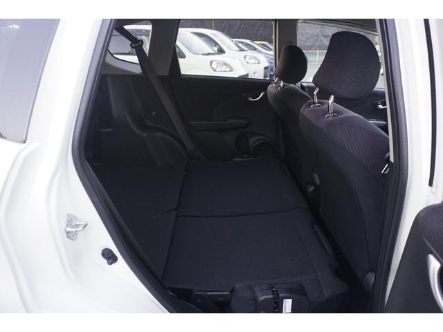 フィットハイブリッド スマートセレクション　１年保証付　純正ＨＤＤナビ　ワンセグＴＶ　バックカメラ　ＣＤ・ＤＶＤ再生　ステアリングスイッチ　ＨＩＤヘッドライト　オートライト　スマートキー　クルーズコントロール　オートエアコン　電動格納ミラー（33枚目）