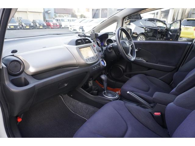 フィットハイブリッド スマートセレクション　１年保証付　純正ＨＤＤナビ　ワンセグＴＶ　バックカメラ　ＣＤ・ＤＶＤ再生　ステアリングスイッチ　ＨＩＤヘッドライト　オートライト　スマートキー　クルーズコントロール　オートエアコン　電動格納ミラー（37枚目）