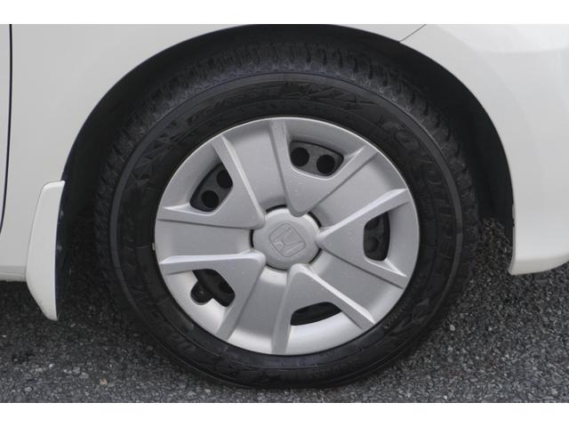 フィットハイブリッド スマートセレクション　１年保証付　純正ＨＤＤナビ　ワンセグＴＶ　バックカメラ　ＣＤ・ＤＶＤ再生　ステアリングスイッチ　ＨＩＤヘッドライト　オートライト　スマートキー　クルーズコントロール　オートエアコン　電動格納ミラー（41枚目）