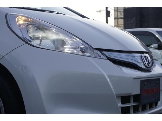 フィットハイブリッド スマートセレクション　１年保証付　純正ＨＤＤナビ　ワンセグＴＶ　バックカメラ　ＣＤ・ＤＶＤ再生　ステアリングスイッチ　ＨＩＤヘッドライト　オートライト　スマートキー　クルーズコントロール　オートエアコン　電動格納ミラー（42枚目）