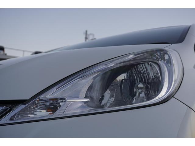 フィットハイブリッド スマートセレクション　１年保証付　純正ＨＤＤナビ　ワンセグＴＶ　バックカメラ　ＣＤ・ＤＶＤ再生　ステアリングスイッチ　ＨＩＤヘッドライト　オートライト　スマートキー　クルーズコントロール　オートエアコン　電動格納ミラー（44枚目）