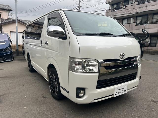 ハイエースバン ロングスーパーGL ディーゼル 15インチアルミ リア小窓付きガラス 純正SDナビ フルセグ SDオーディオ Bオーディオ オートエアコン Wエアバック 100V電源 ステアリングスイッチ リアシートベルト 記録簿(3枚目)