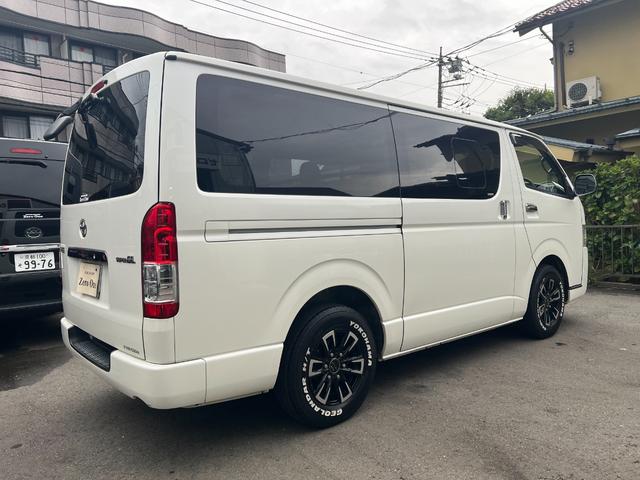 ハイエースバン ロングスーパーGL ディーゼル 15インチアルミ リア小窓付きガラス 純正SDナビ フルセグ SDオーディオ Bオーディオ オートエアコン Wエアバック 100V電源 ステアリングスイッチ リアシートベルト 記録簿(6枚目)